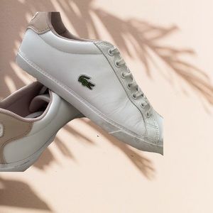 White and pink Lacoste lace up shoes